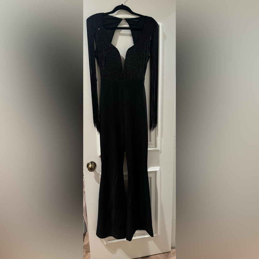 BLACK FLARE CUT JUMPSUIT
